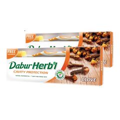 Dabur Herbal Cavity Protect Clove Toothpaste, 140 gm + Toothbrush (Pack Of 2)