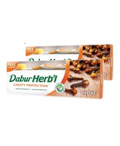 Dabur Herbal Cavity Protect Clove Toothpaste, 140 gm + Toothbrush (Pack Of 2)